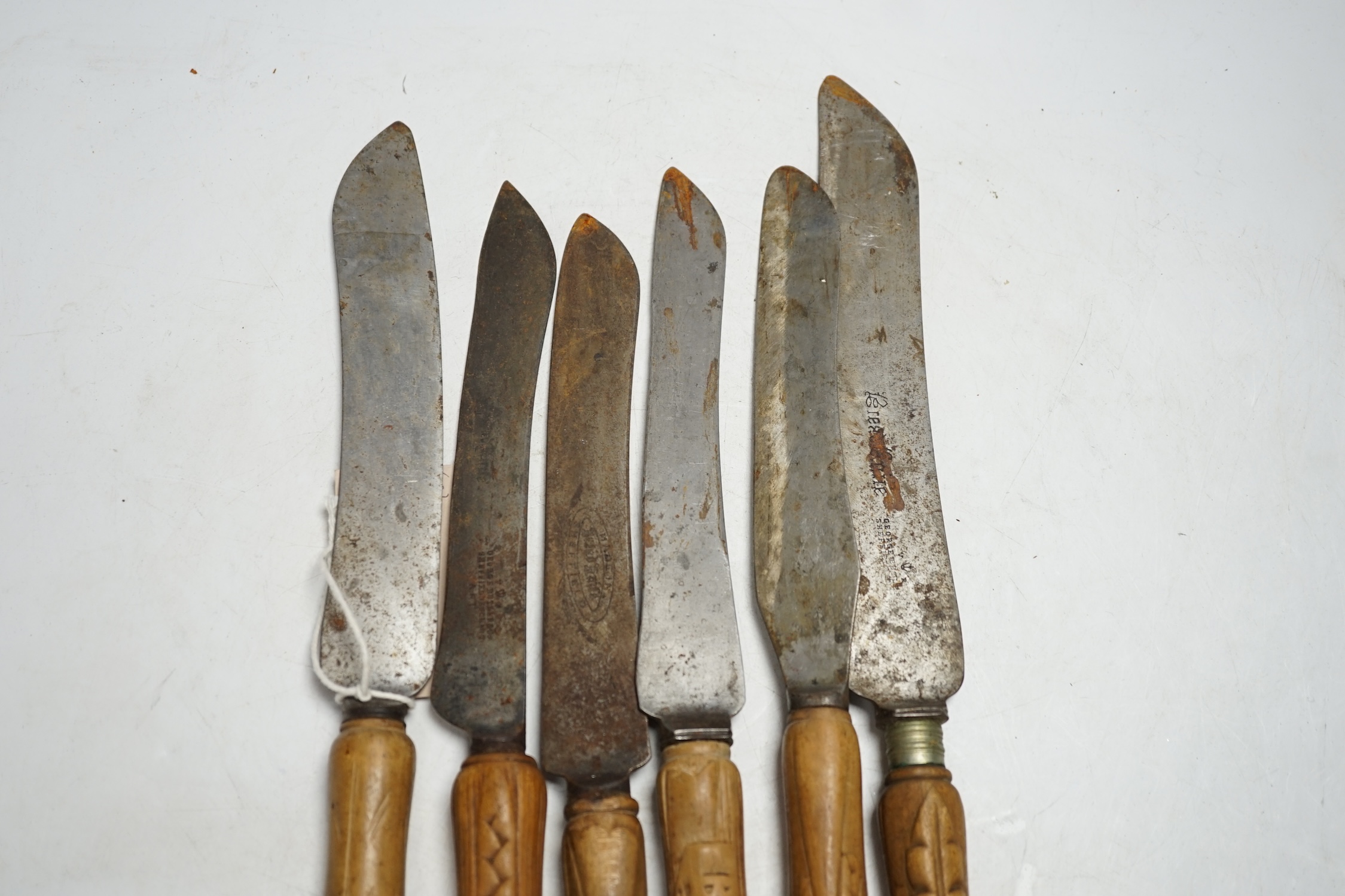 Six Victorian wood handled bread knives, longest 35.5cm